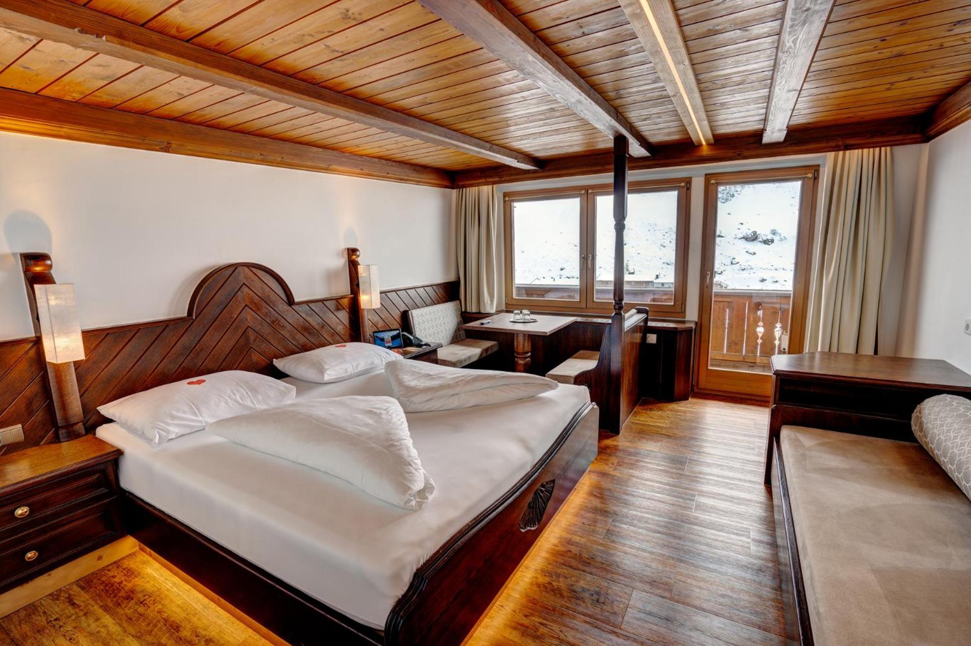 Alpenbad Hotel Hohenhaus Tux Quarto foto