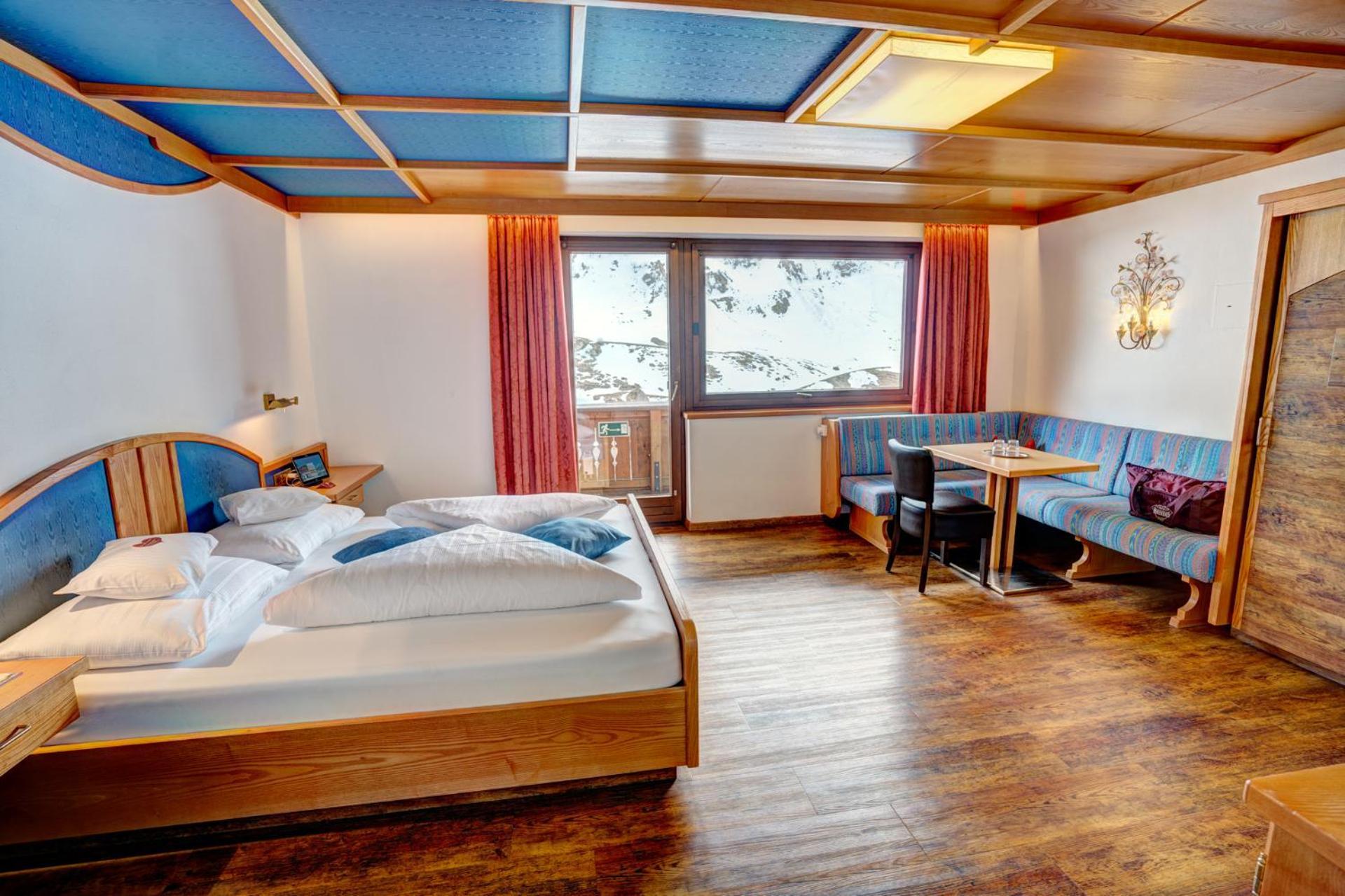 Alpenbad Hotel Hohenhaus Tux Quarto foto
